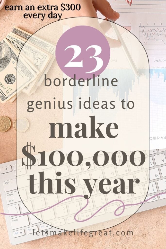 person holding a handful of cash while sitting at a desk