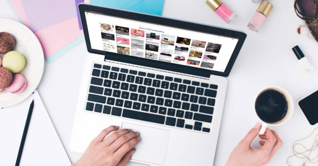 laptop on desk with computer screen on Pinterest website